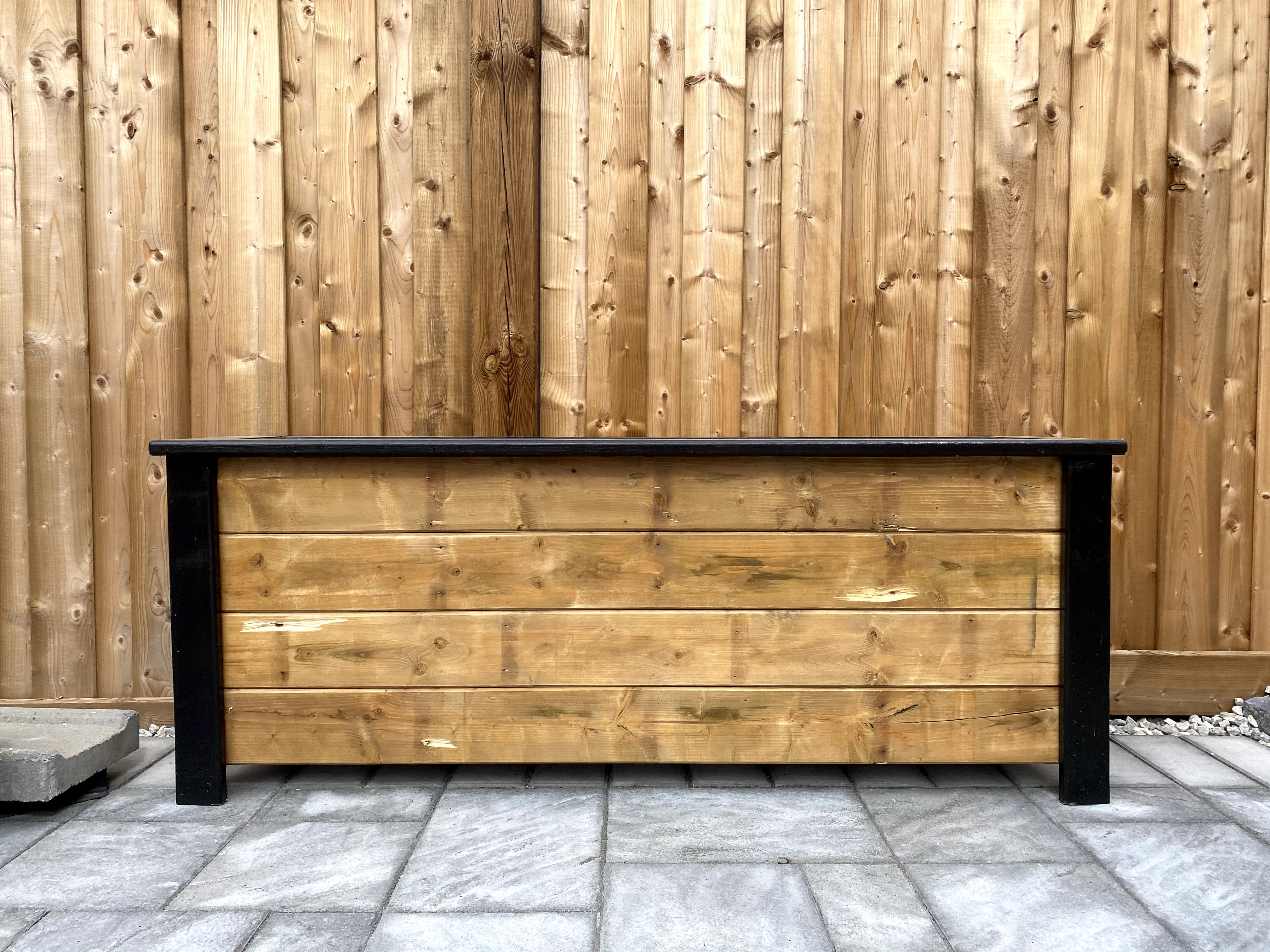 Cedar planter with black legs