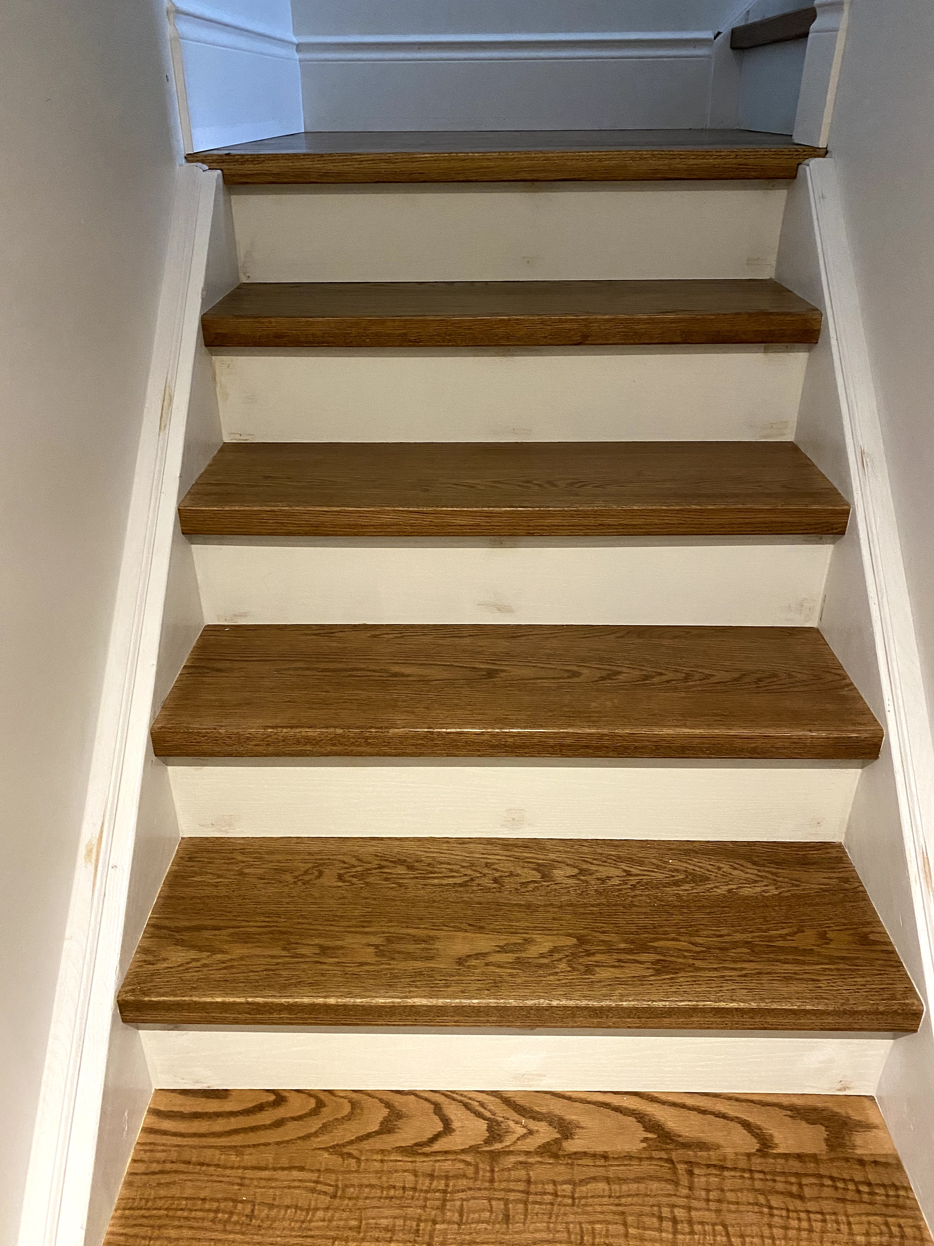 piano stairs with oak stained treads
