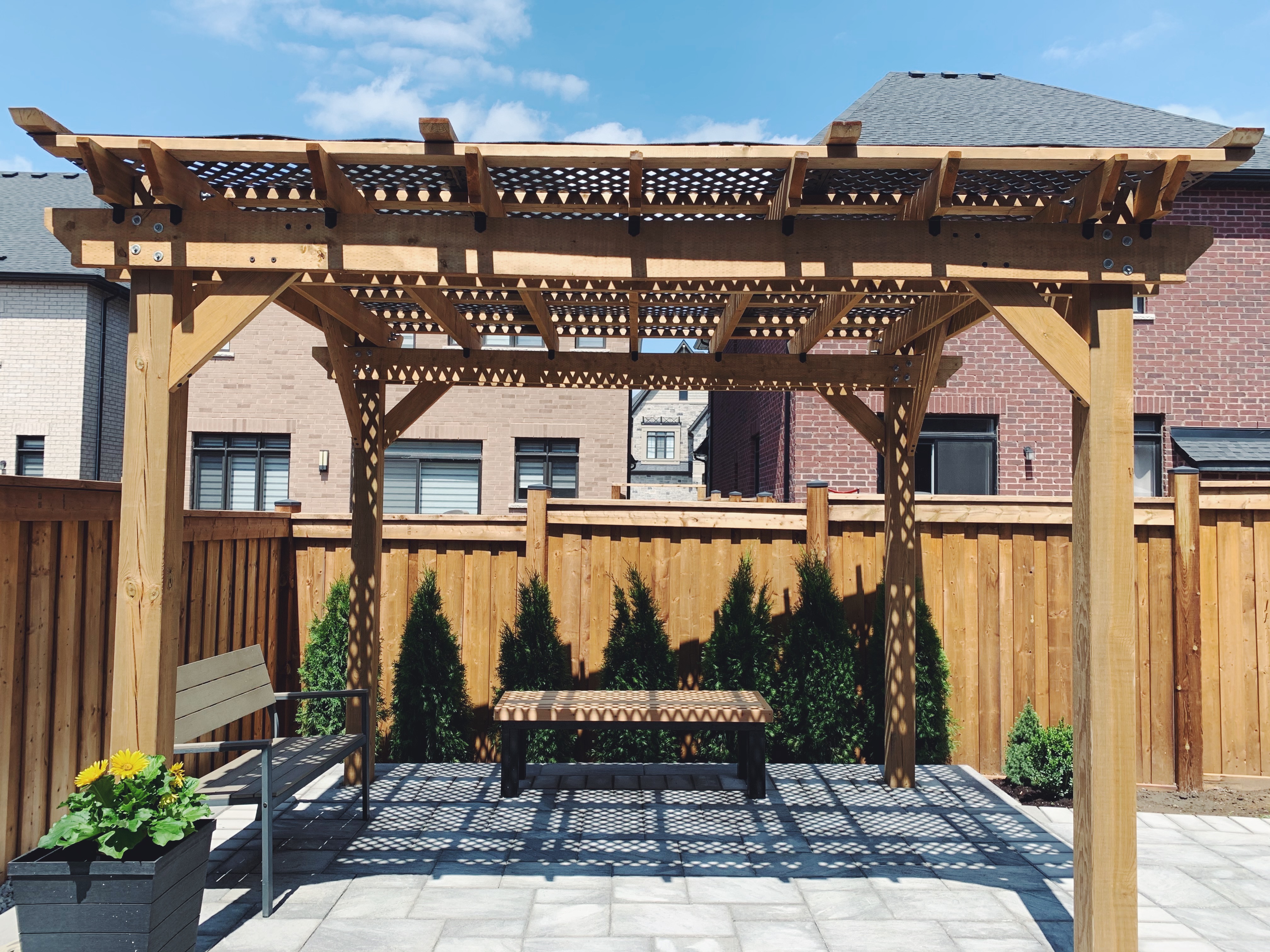 pergola with cedar trees interlock